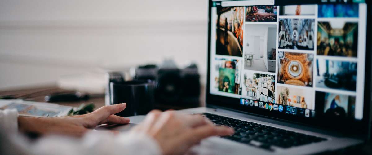 8 Ways to promote your real estate blog photo of a phone using social media and and tagging to network in real estate