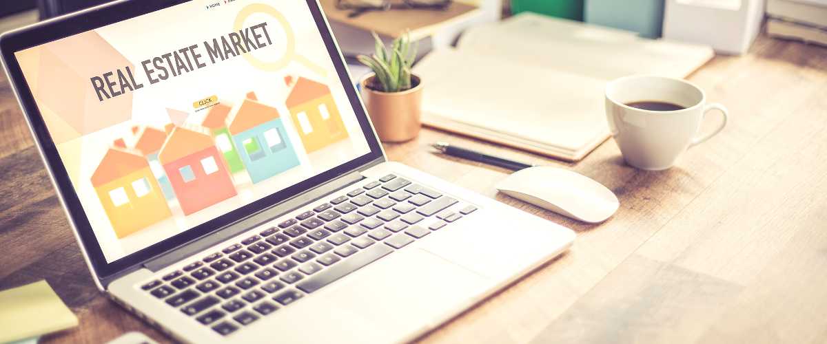 Computer with Real Estate Market photo of a computer ranking on Google for real estate market