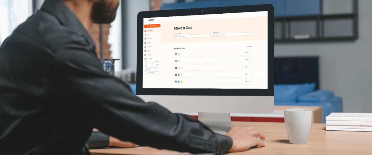 Lead Capture of Zapier photo of computer with a realtor creating a zap with Zapier to automate lead generation